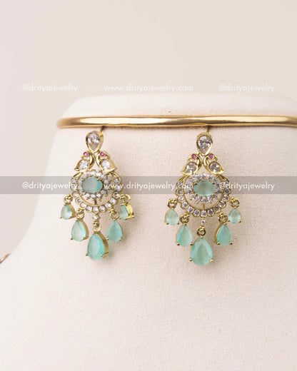 Victorian earrings with mint stones, CZ accents, and gold polish
