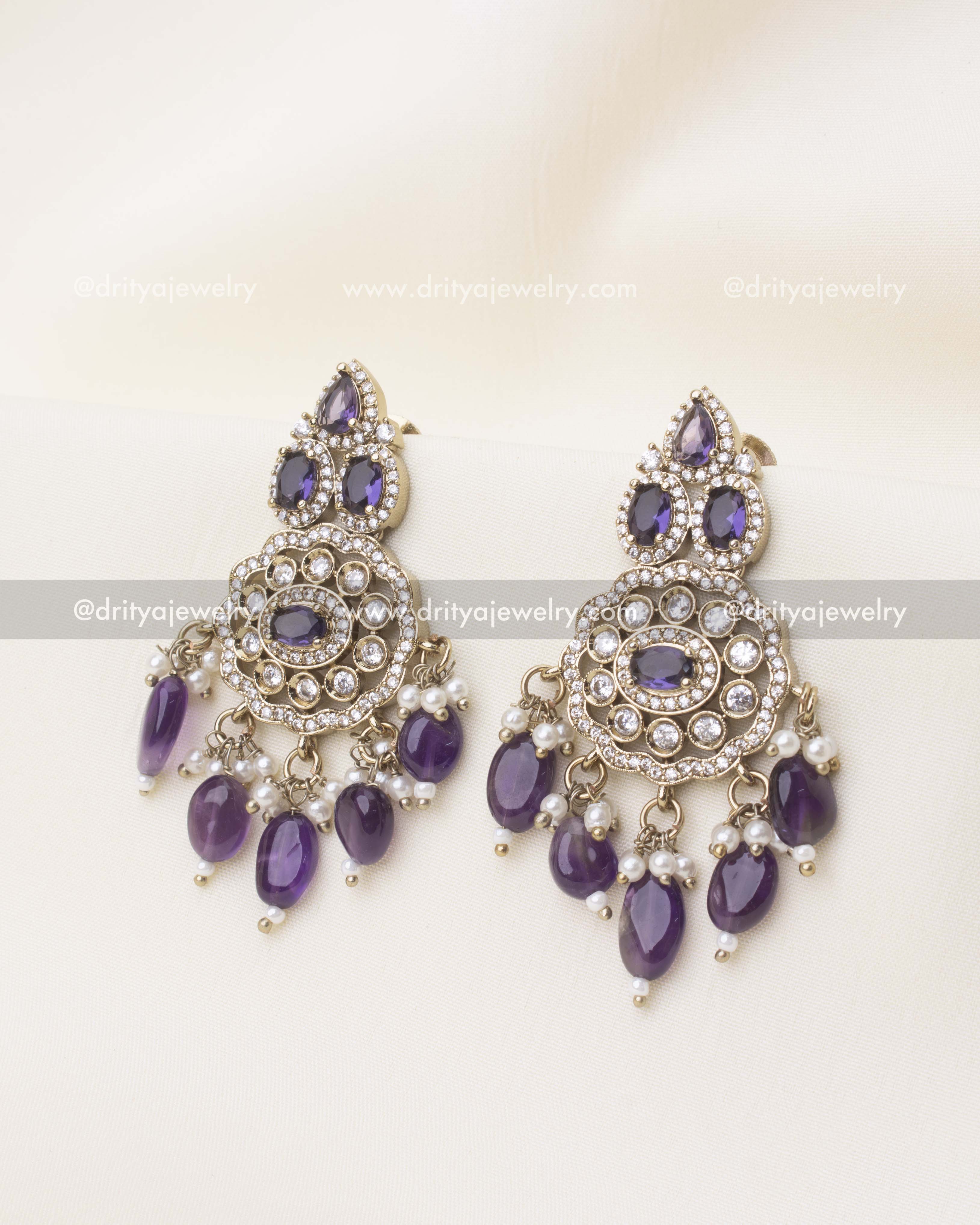 Matching Victorian earrings with purple stones and pearl drops from choker set
