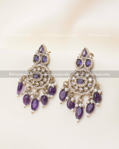 Matching Victorian earrings with purple stones and pearl drops from choker set