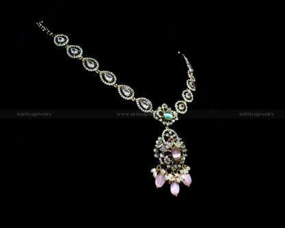 Side view of the Dritya Jewelry Victorian Necklace displaying its detailed craftsmanship and hanging pearl accents.