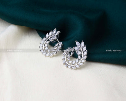 Leaf-inspired zircon earrings with white CZ stones in a silver-tone finish.