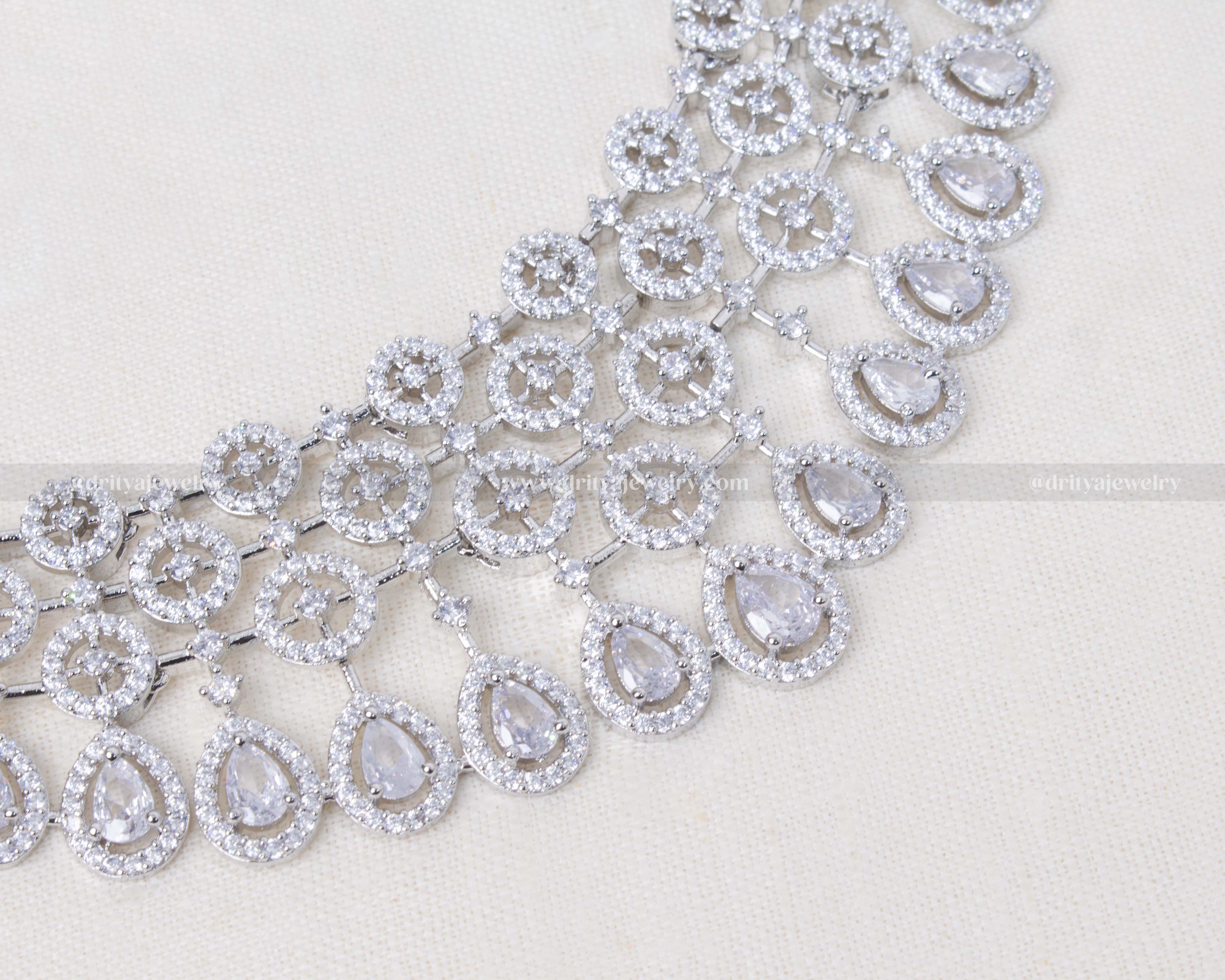 Elegant Zircon Radiance short necklace set with sparkling cubic zirconia, accompanied by matching earrings.