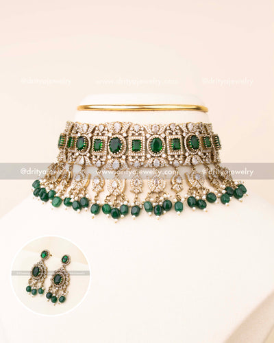 Exquisite bridal choker set with emerald green stones and matching earrings.