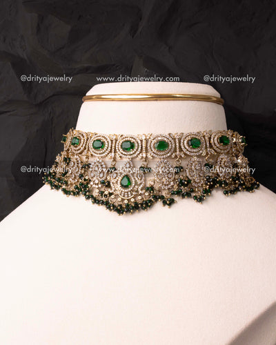 Heavy Victorian choker with green crystals and AD stones displayed on mannequin.