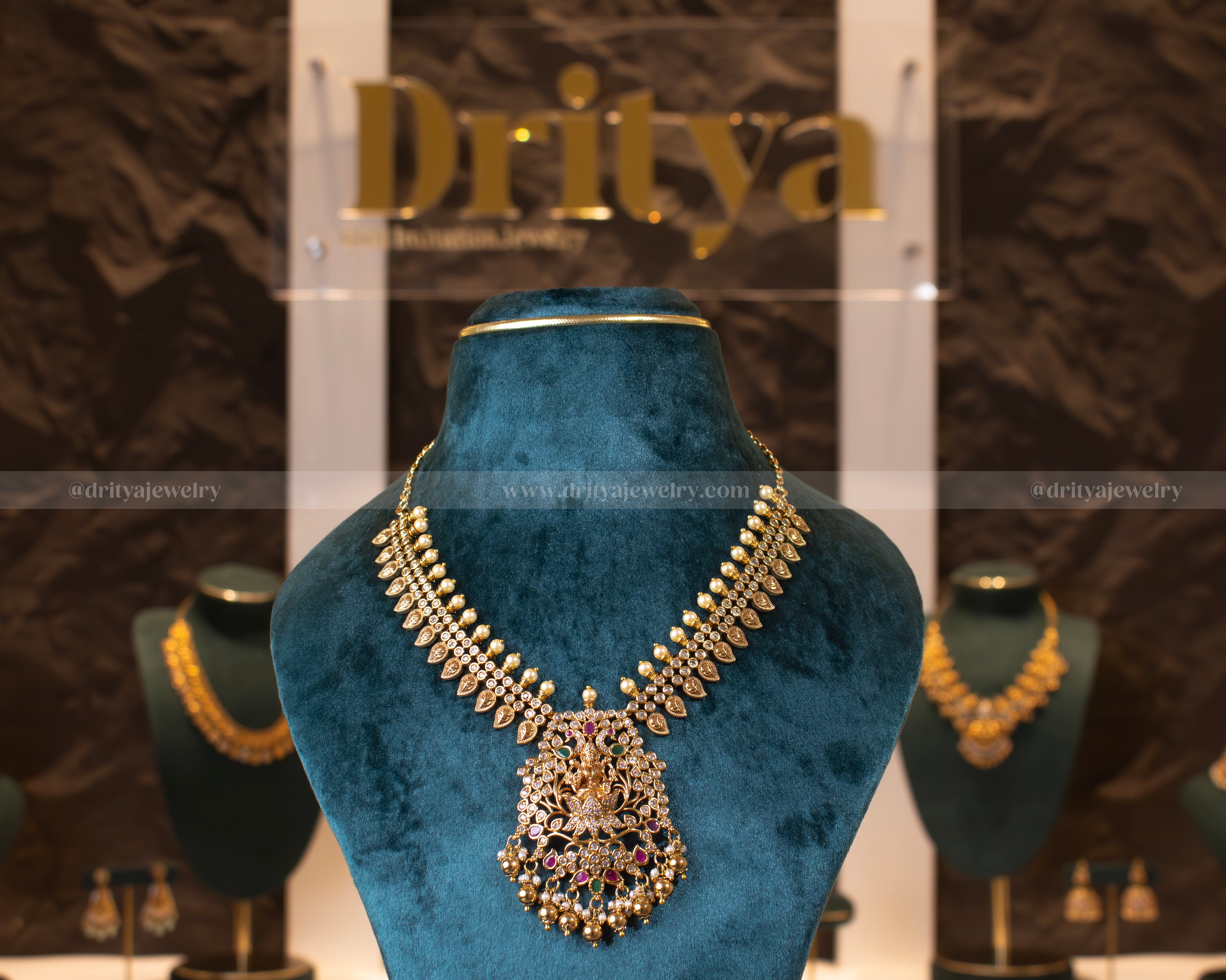 Front view of the Lakshmi Devi Temple Necklace Set by Dritya Jewelry, adorned with gold beads, pearls, and traditional temple jewelry elements.