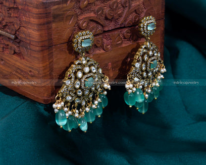 Front view of Victorian pendant with turquoise beads and matching earrings set by Dritya Jewelry.