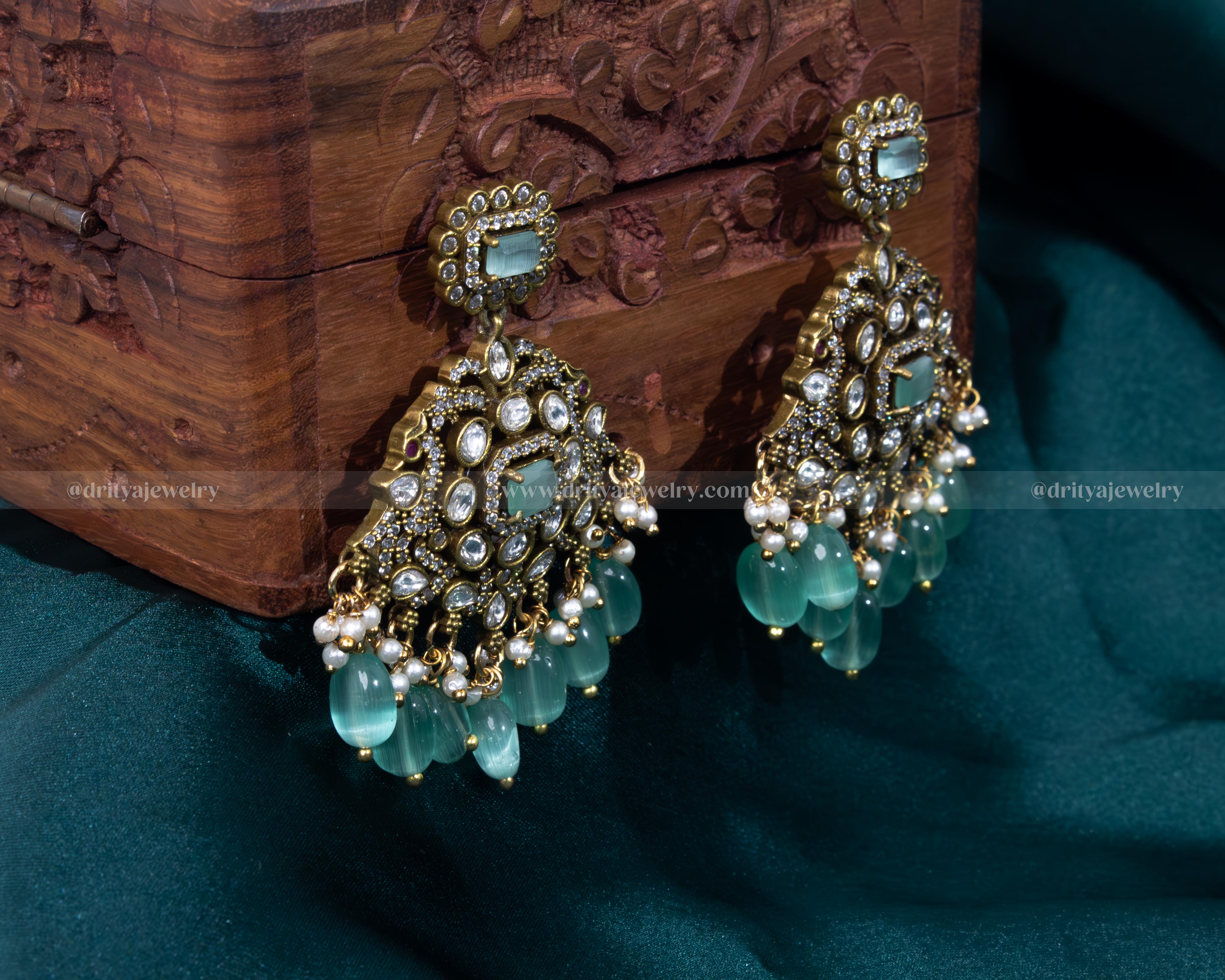 Front view of Victorian pendant with turquoise beads and matching earrings set by Dritya Jewelry.