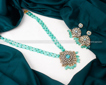 Front view of Victorian pendant with turquoise beads and matching earrings set by Dritya Jewelry.