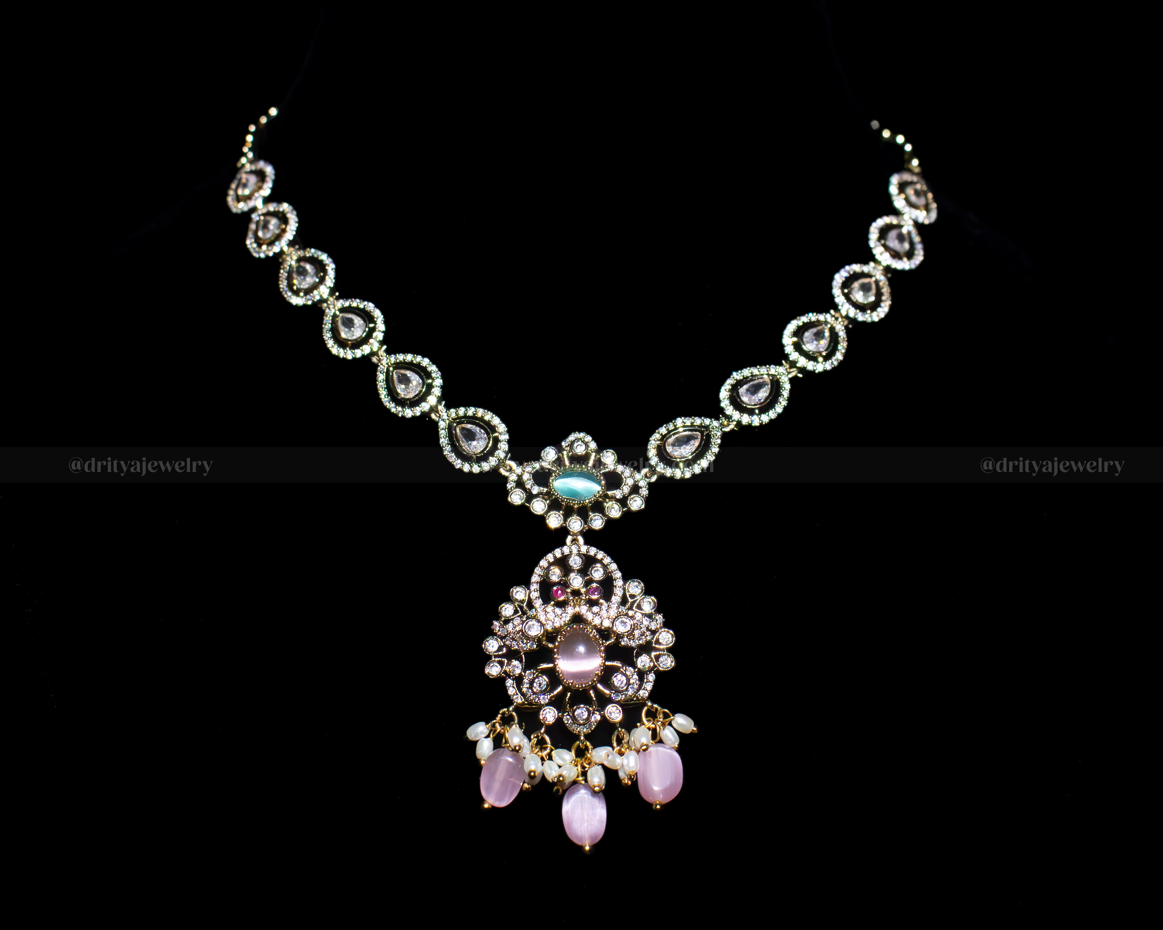 Front view of the Victorian Mehndi Necklace Set by Dritya Jewelry featuring an intricate pendant and teardrop-shaped stones.