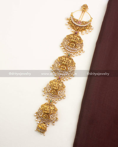 Antique gold Temple Jada Billa with Lakshmi motif and layered panels – full vertical view.