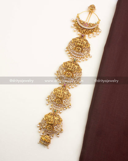 Antique gold Temple Jada Billa with Lakshmi motif and layered panels – full vertical view.