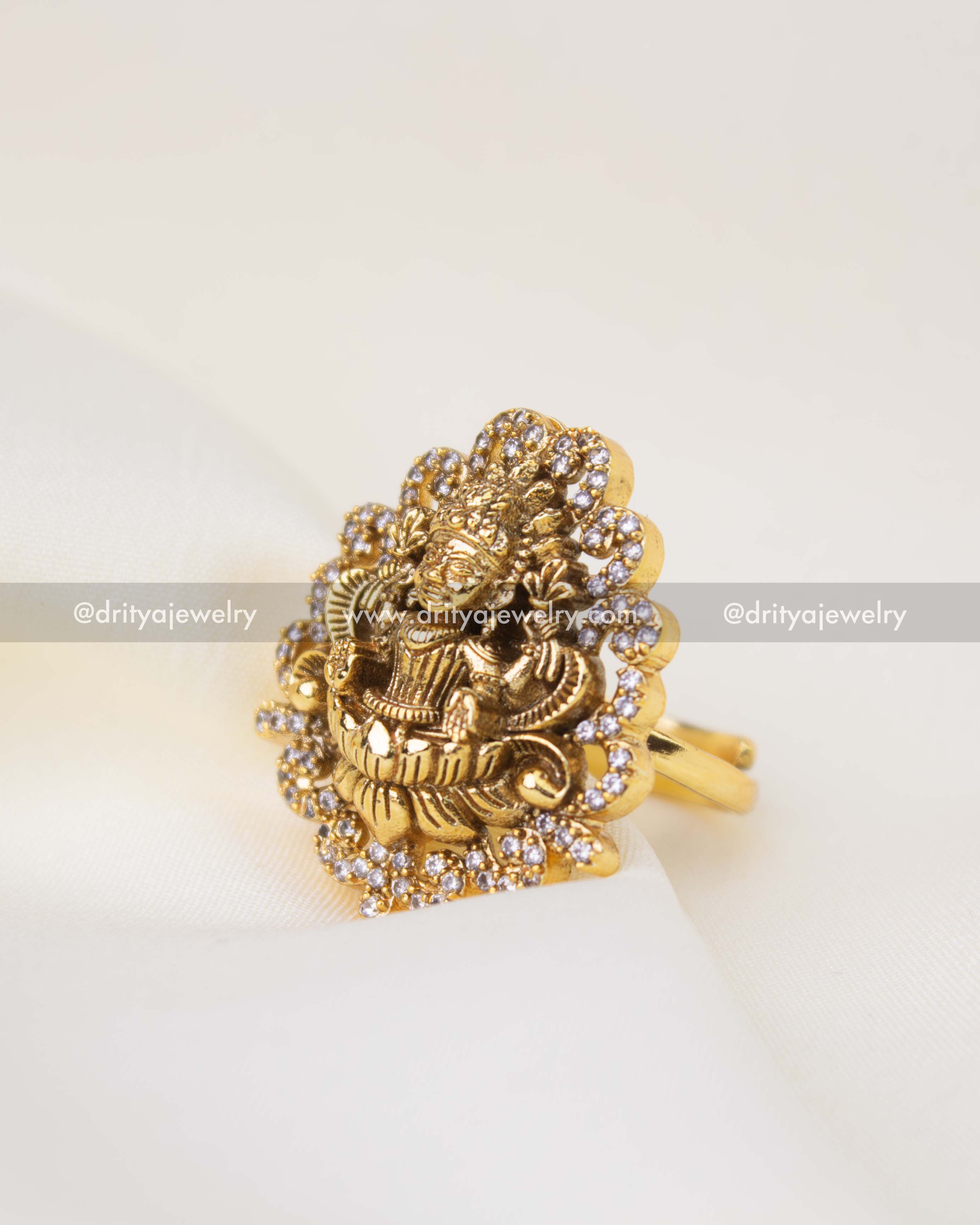 Traditional South Indian Nakshi temple ring featuring Lakshmi motif and CZ halo