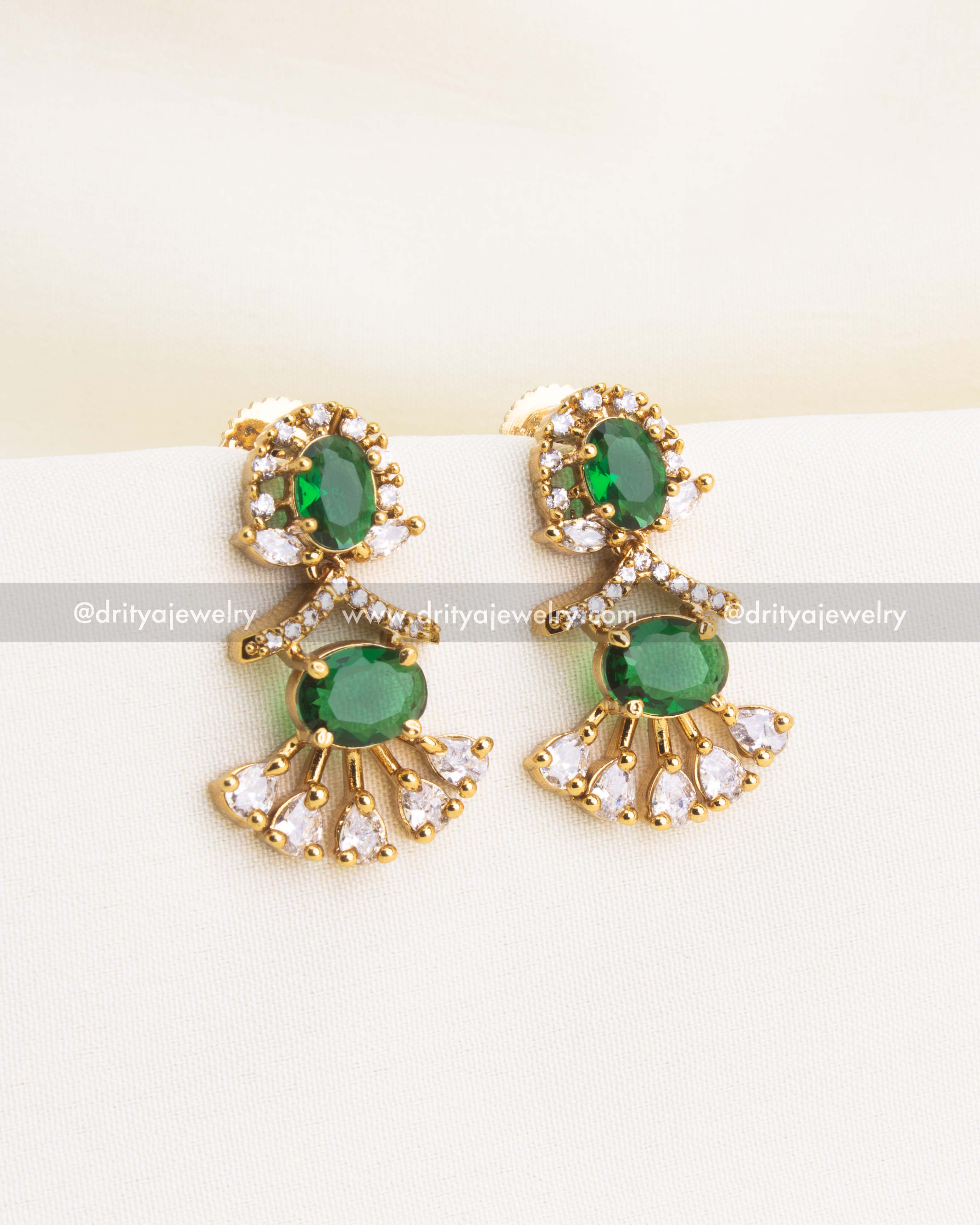 Elegant emerald green CZ short necklace with matching earrings in gold polish finish.