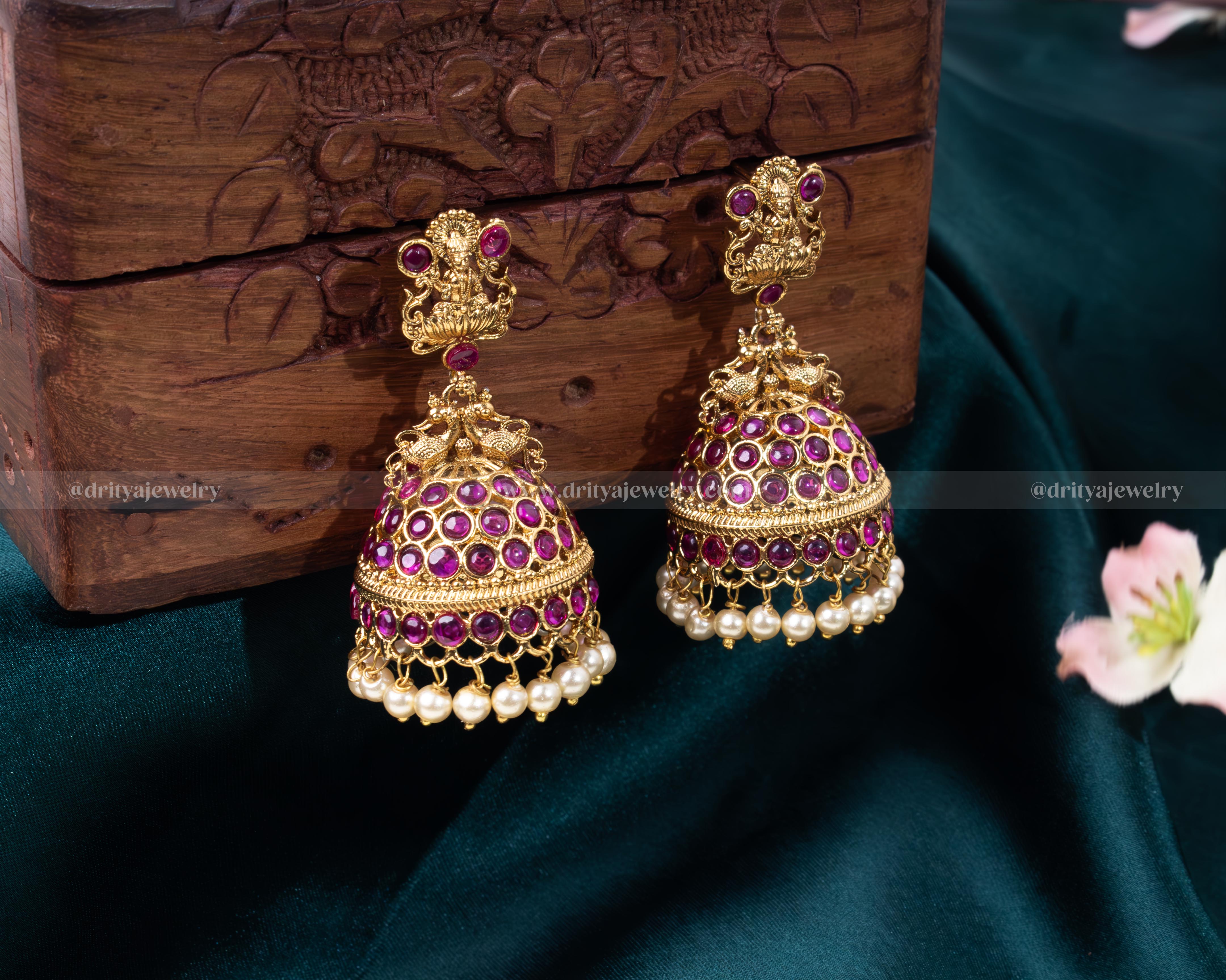 Detailed craftsmanship of Jadau technique in traditional jhumka earrings - Dritya Jewelry