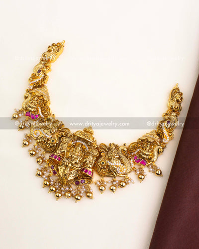 Premium short temple necklace set with Lakshmi nakshi work and ruby kemp accents.