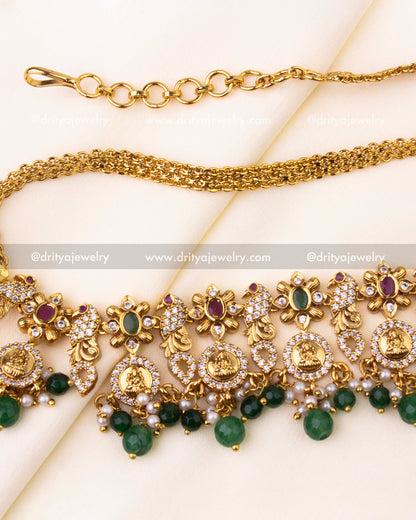 Temple jewelry hip chain with green beads, pearl clusters, and antique gold finish.