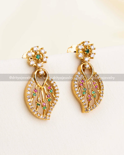 Matching leaf drop earrings with pink and green CZ details and floral top
