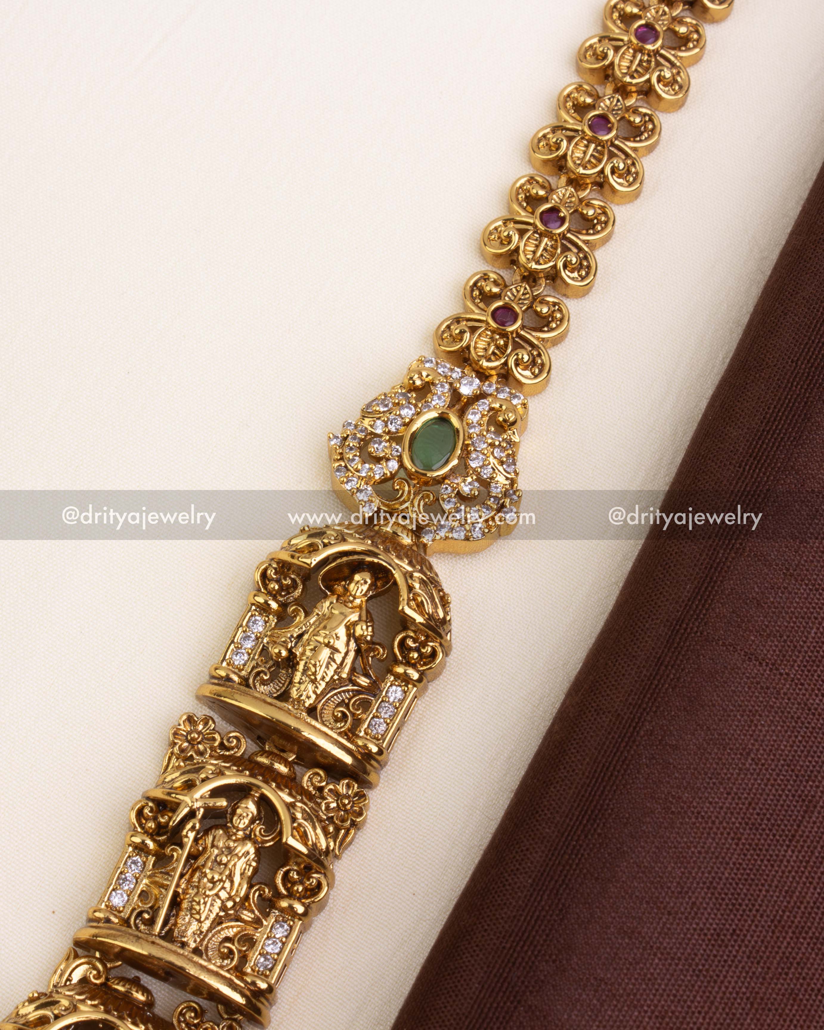 Krishna and Lakshmi figure detailing on Nakshi long necklace links with CZ stones