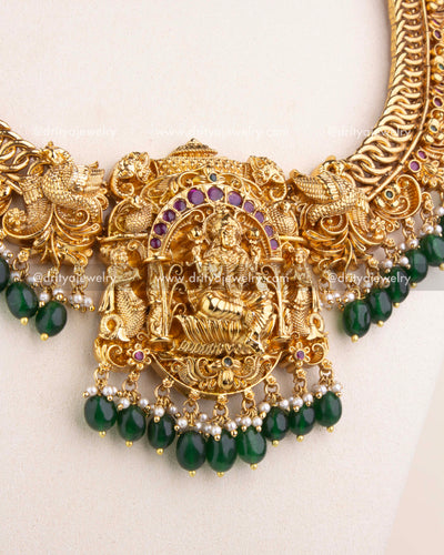 Lakshmi Devi Pendant with Emerald Drops and Temple Motifs