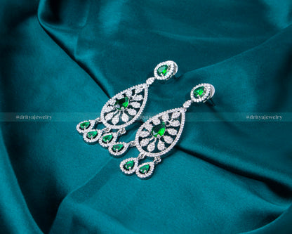 Elegant rhodium-plated necklace set with emerald and CZ stones, perfect for special occasions and formal events.