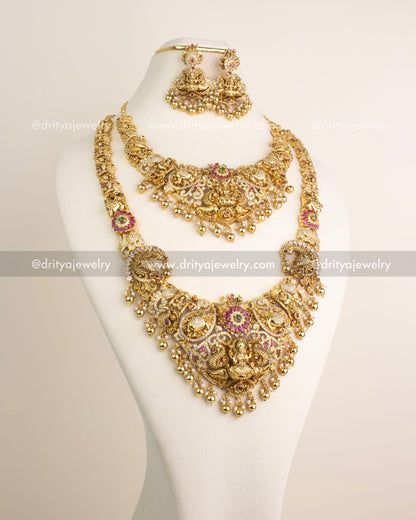 Traditional Nakshi combo set featuring long necklace, short necklace, and danglers with Lakshmi motifs and gold bead hangings.