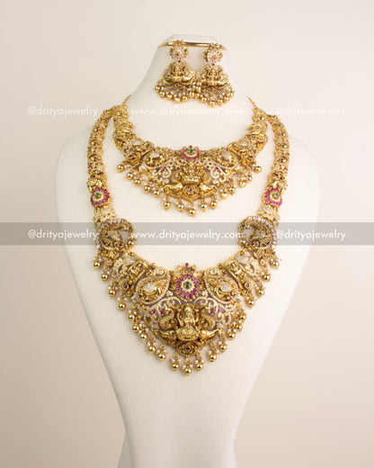 Traditional Nakshi combo set featuring long necklace, short necklace, and danglers with Lakshmi motifs and gold bead hangings.