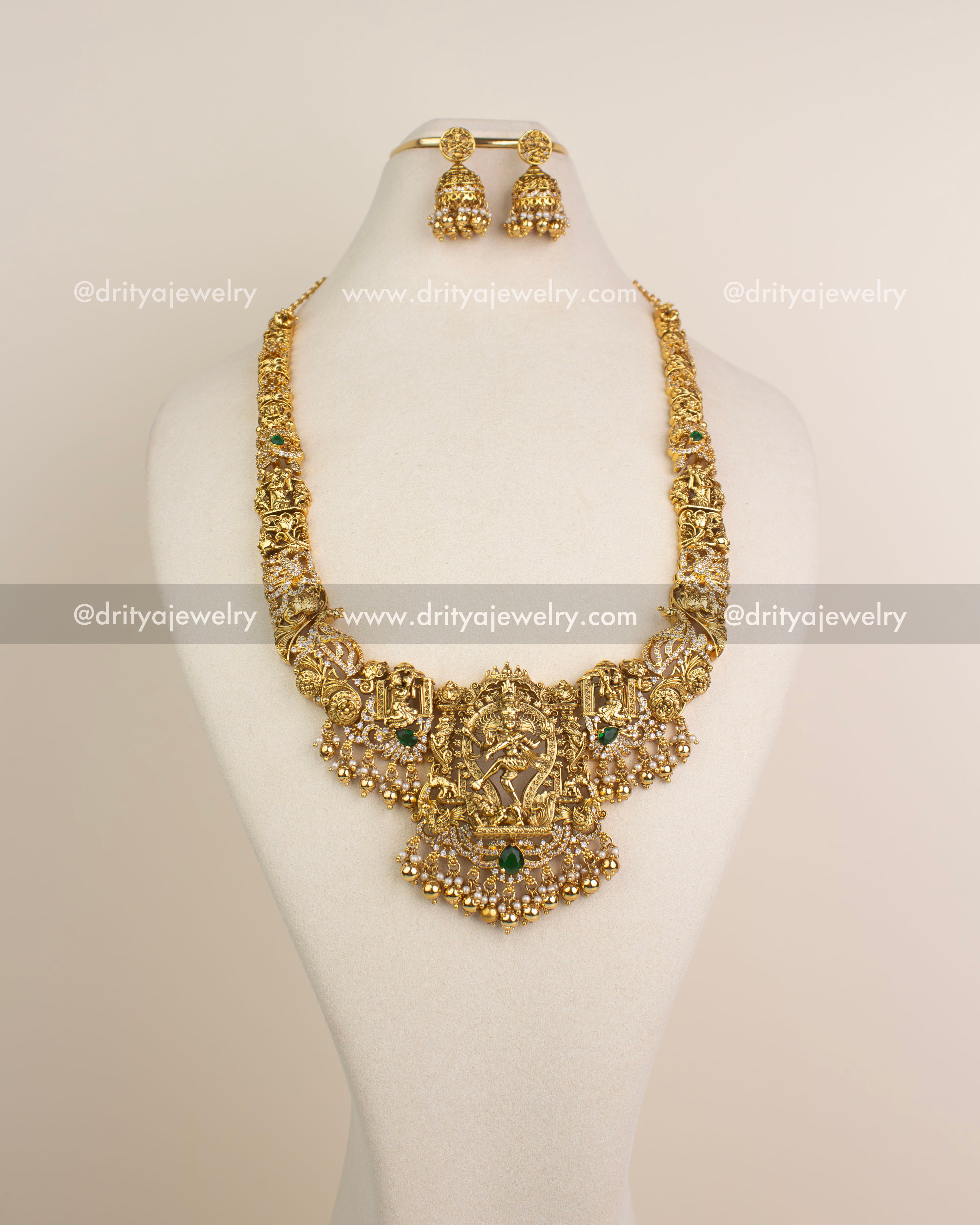 Front view of Nataraja temple long haram styled on a display bust.