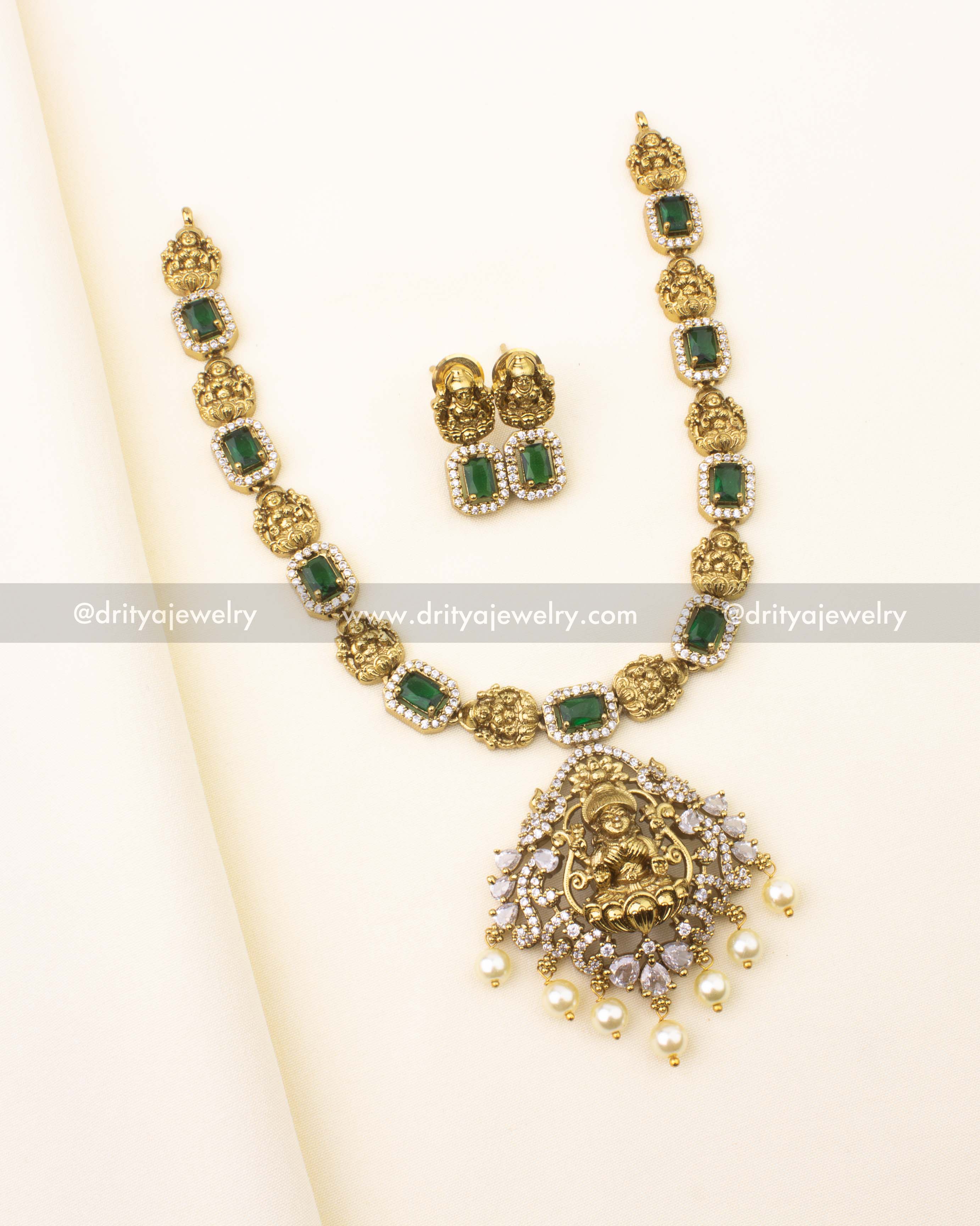 Antique short necklace set with green stones and Lakshmi Devi pendant – front view