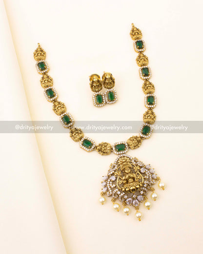 Antique short necklace set with green stones and Lakshmi Devi pendant – front view