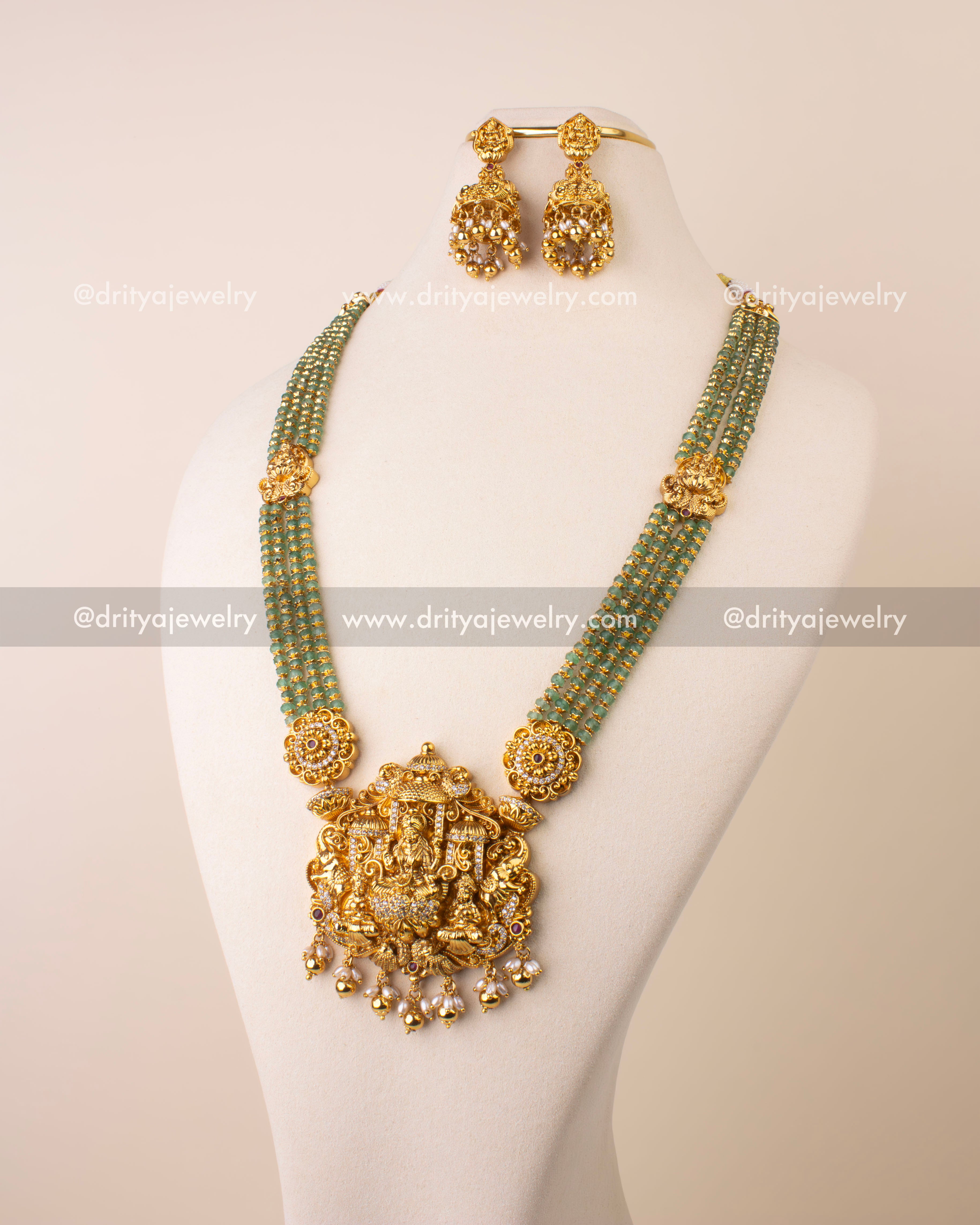 Premium Temple Beads Necklace with Lakshmi Devi pendant and matching jhumkas displayed on mannequin