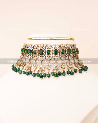 Exquisite bridal choker set with emerald green stones and matching earrings.