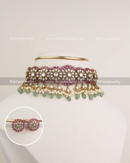 Full display of the polki kundan choker with matching earrings, showcasing bead drops and craftsmanship.