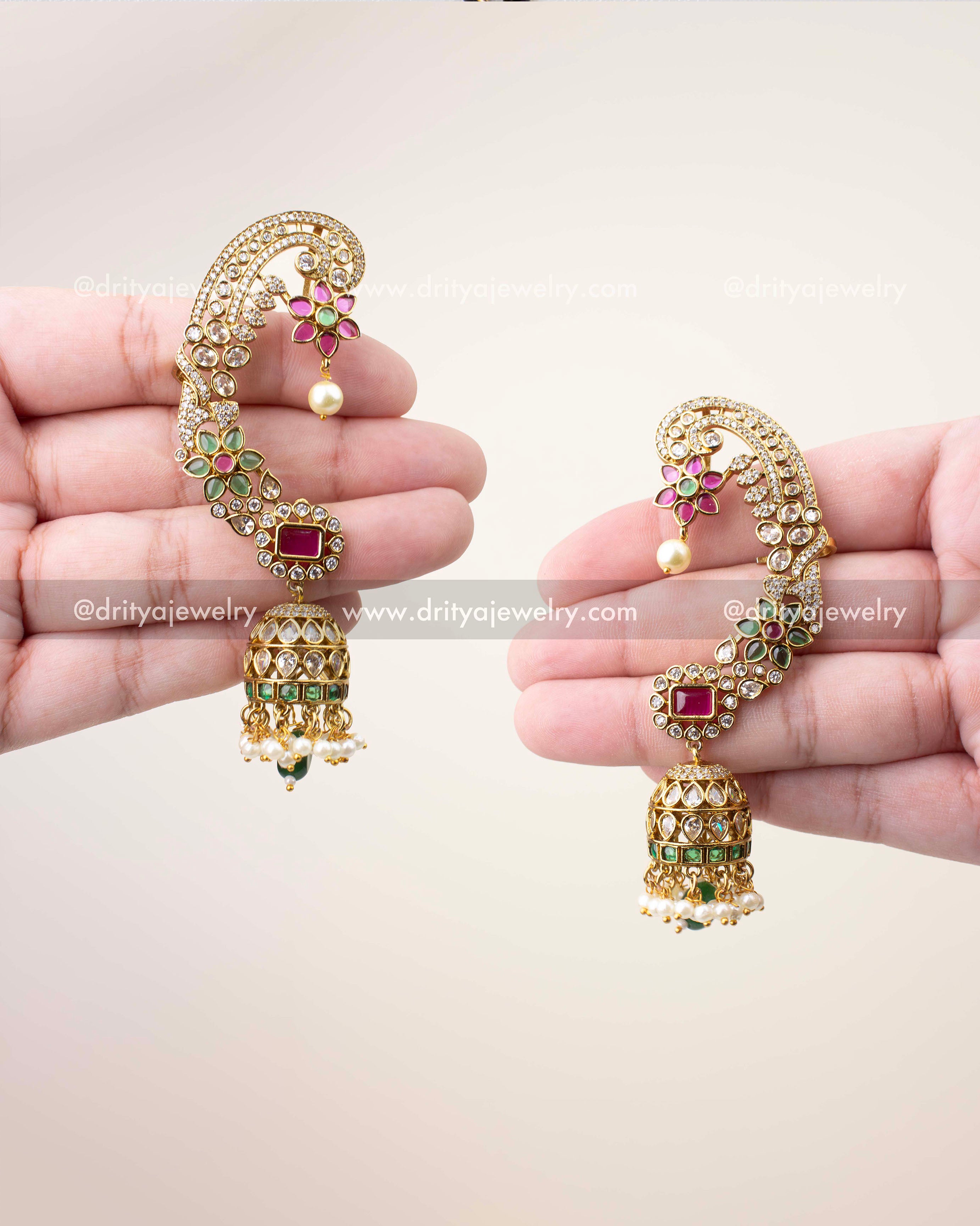 Premium ear cuffs with floral design, CZ stones, pearl jhumka drop, and antique gold finish