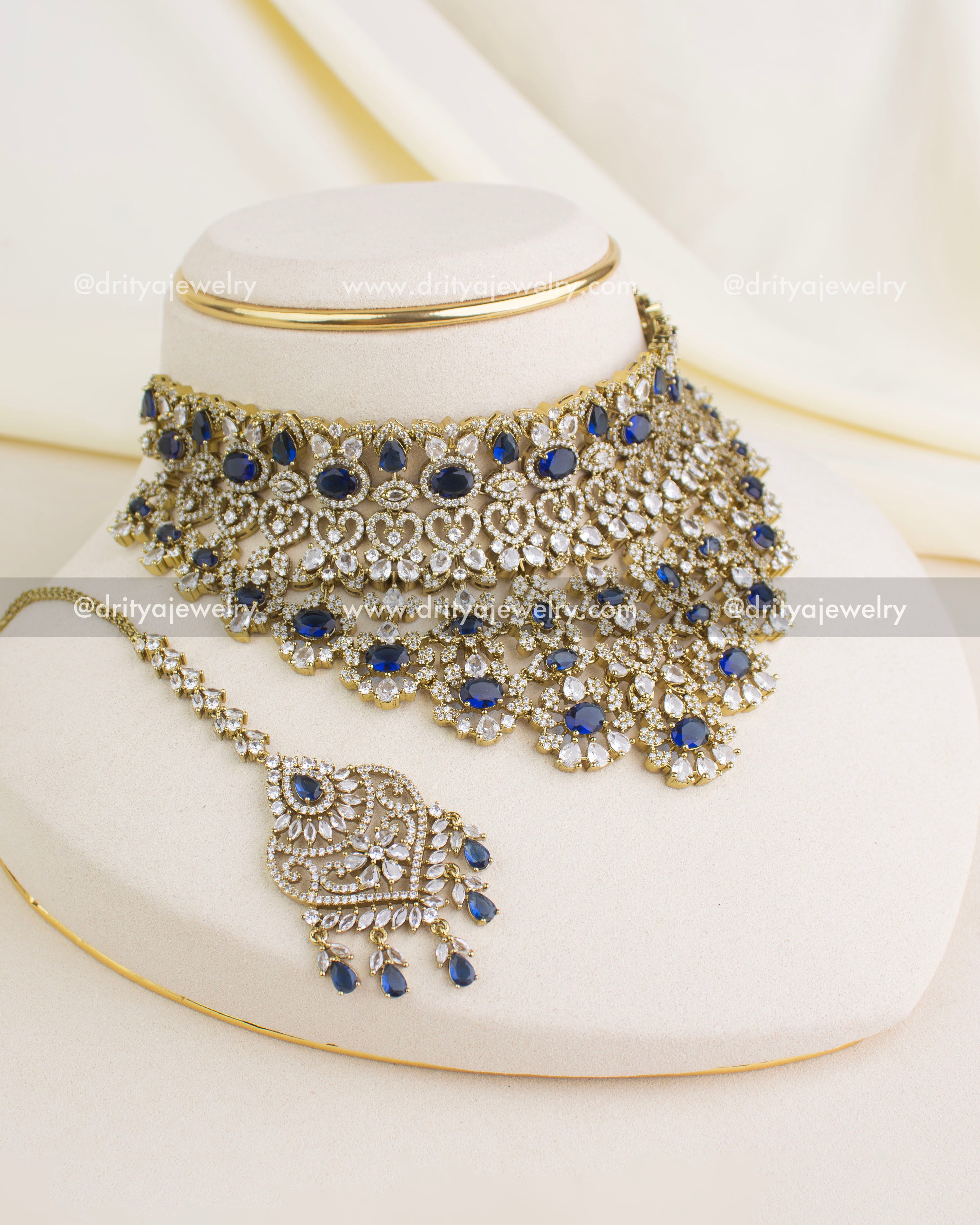 Complete sapphire blue Victorian choker set with matching big danglers and ornate maang tikka.