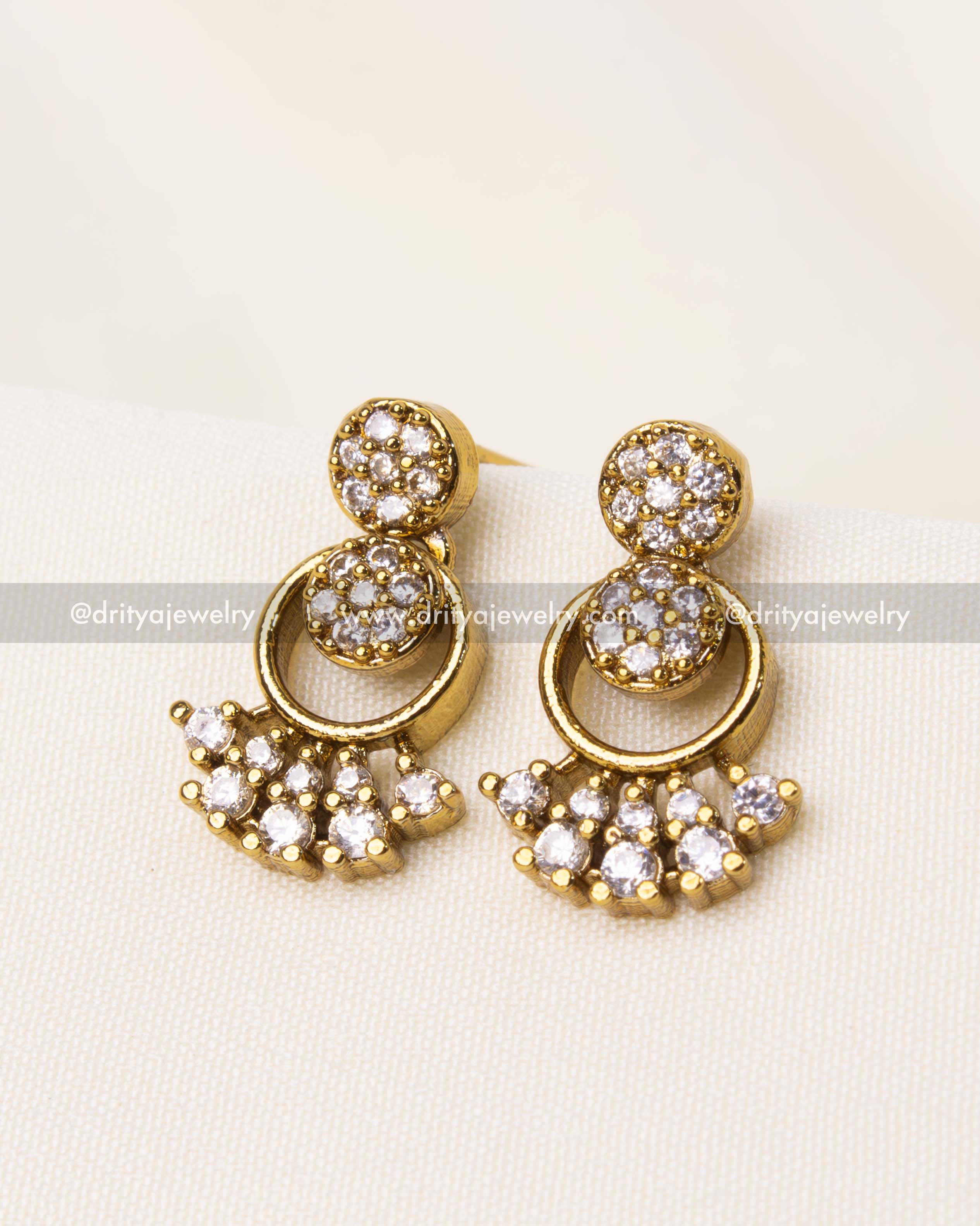 Elegant CZ stud earrings designed to complement the short necklace set.