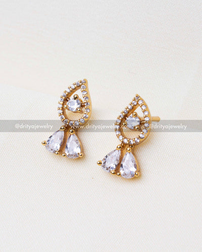 Matching CZ earrings with teardrop design