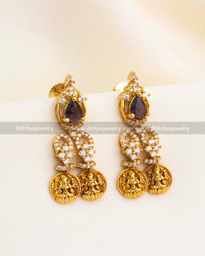 Temple-style earrings with Lakshmi coins, CZ accents, and gold plating.