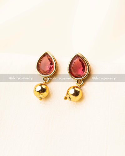 Gold-plated ruby red earrings with classic rounded drop beads.