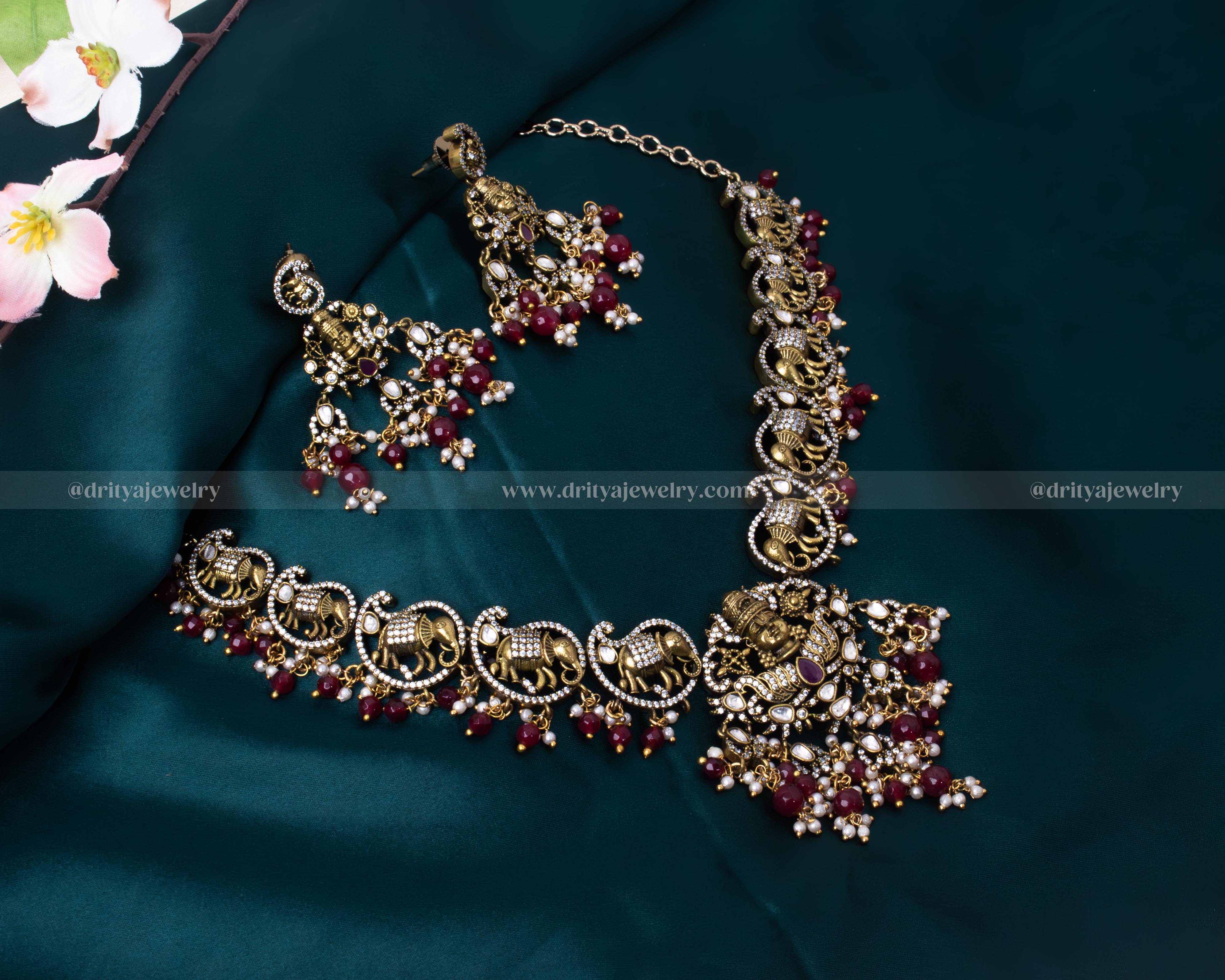 Dritya Jewelry's Mehndi Victorian Balaji Necklace Set with Balaji pendant and elephant motifs, adorned with ruby beads, perfect for weddings and cultural ceremonies.