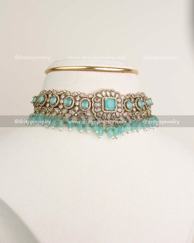 Victorian mint choker with CZ stones and droplet beads displayed on a jewellery stand.