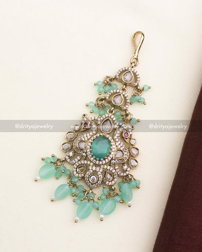 Mint green Victorian bridal maang tikka with kundan work and pastel bead drops