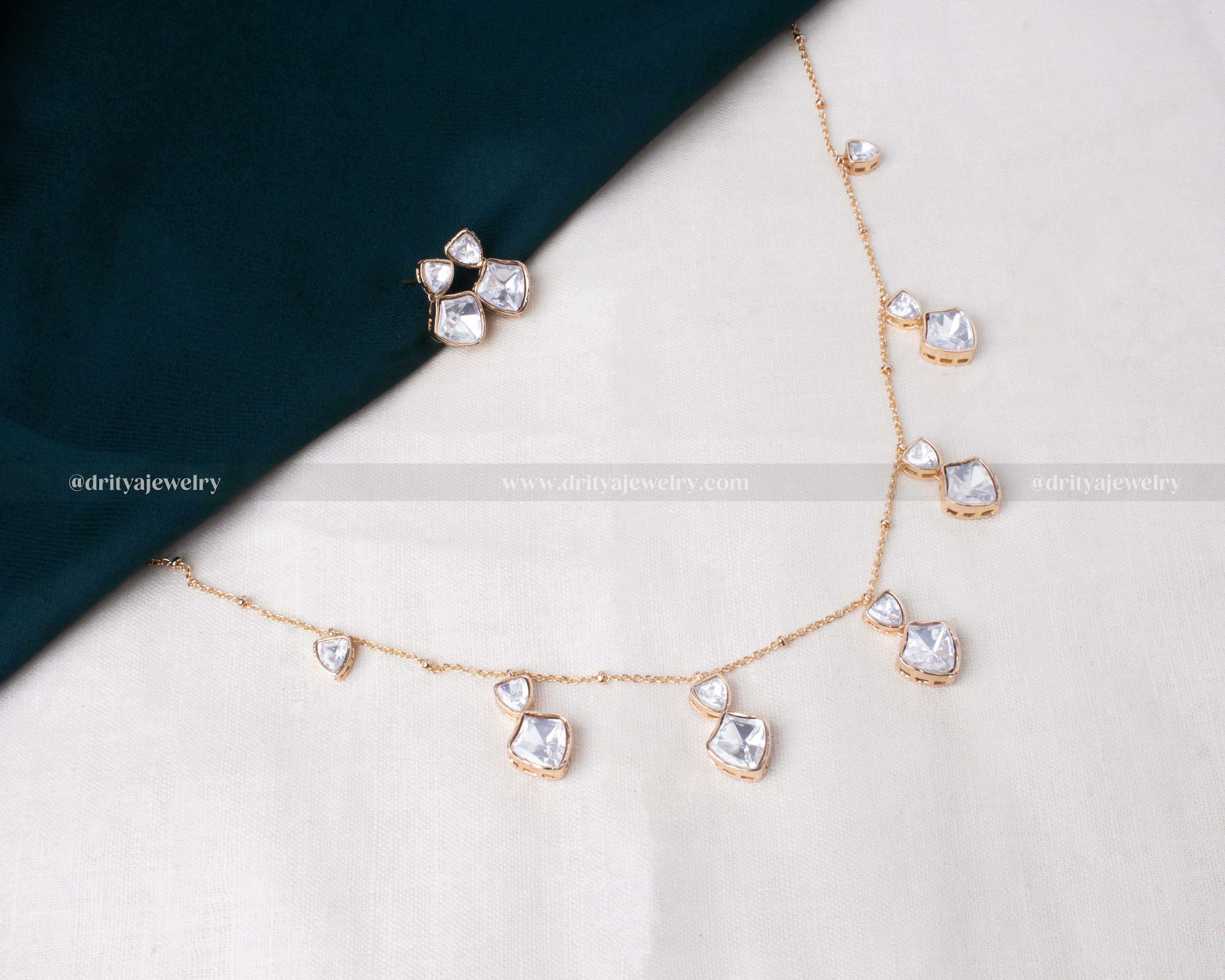 Premium moissanite necklace with invisible floating design and carrot gold polish, perfect for elegant occasions.