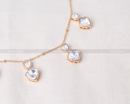 Premium moissanite necklace with invisible floating design and carrot gold polish, perfect for elegant occasions.