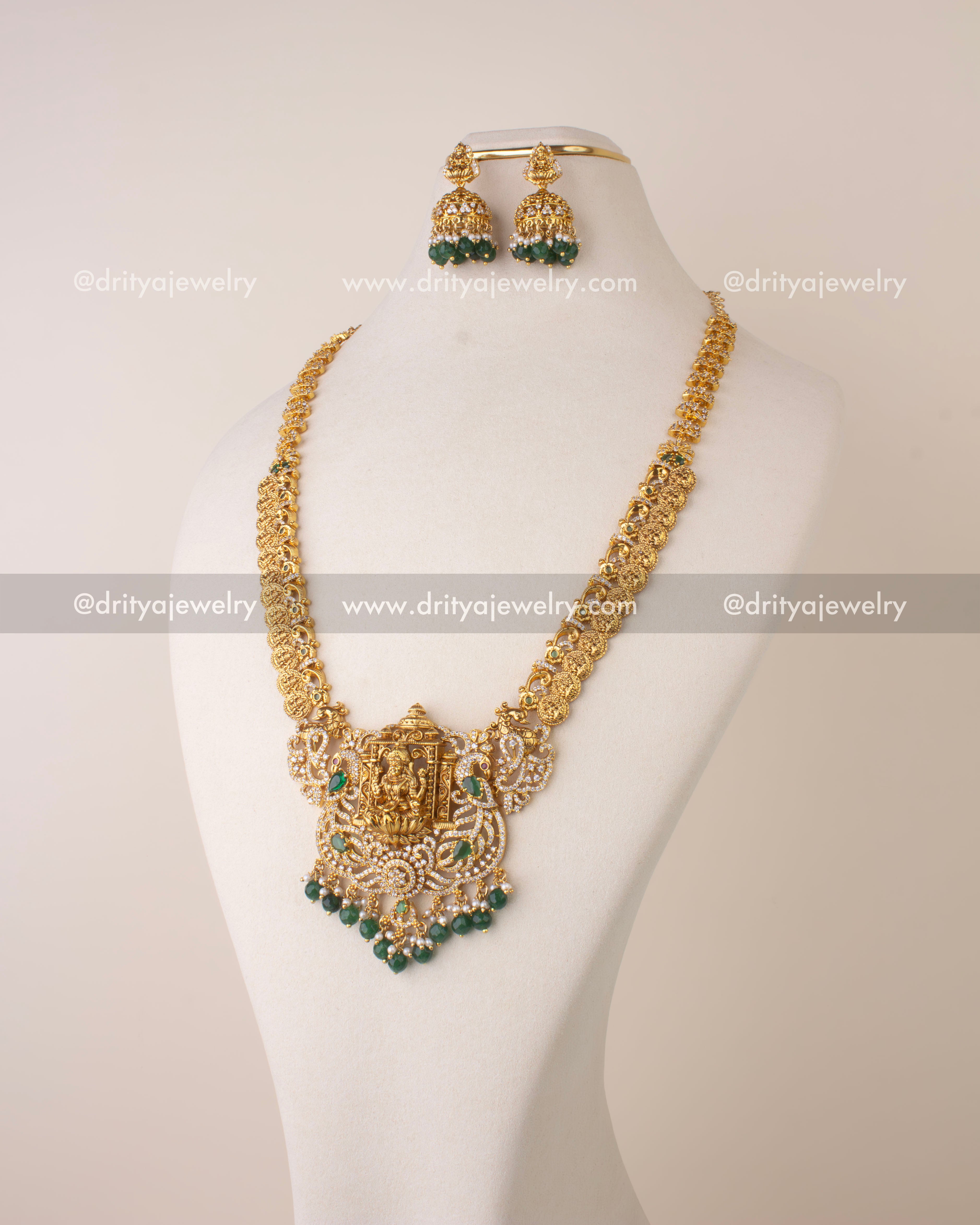 Premium Nakshi long necklace featuring Goddess Lakshmi pendant with Kasulu coin chain, CZ stones, and green bead drops.