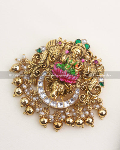 Premium nakshi temple pendant featuring meenakari Lakshmi, kemp stones, kundan detailing, and pearl-gold danglers.