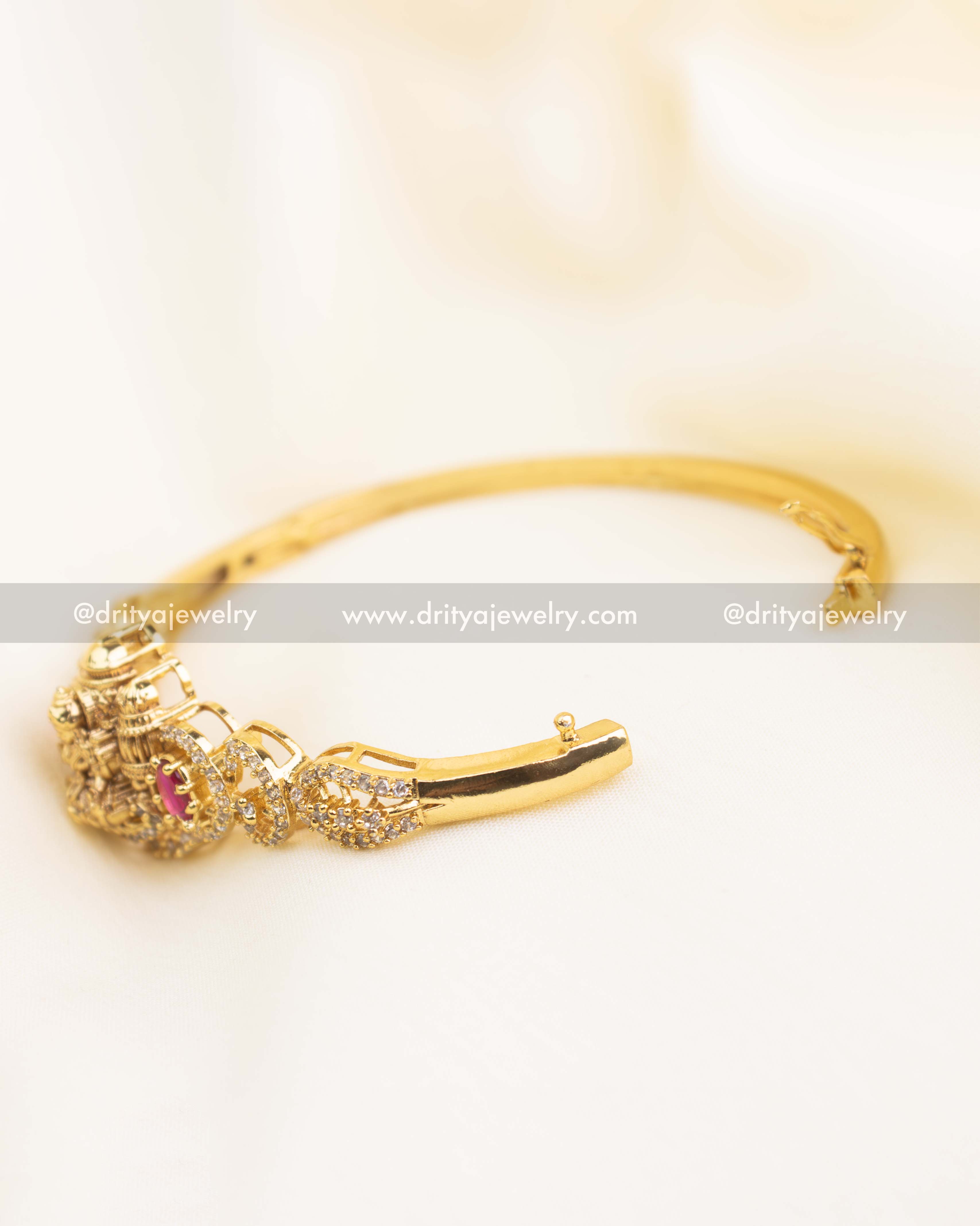 Openable adjustable temple kada showing inner hinge and polished gold finish.