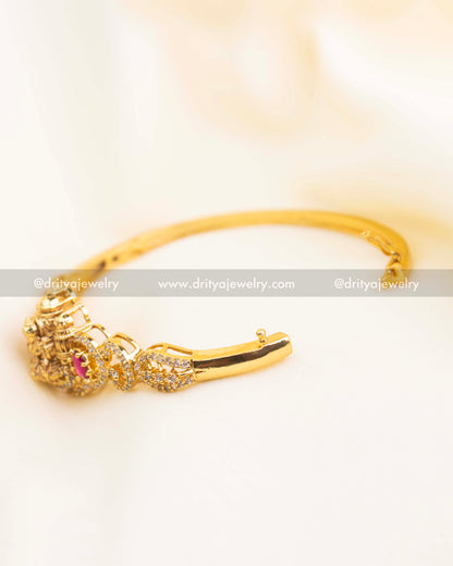 Openable adjustable temple kada showing inner hinge and polished gold finish.