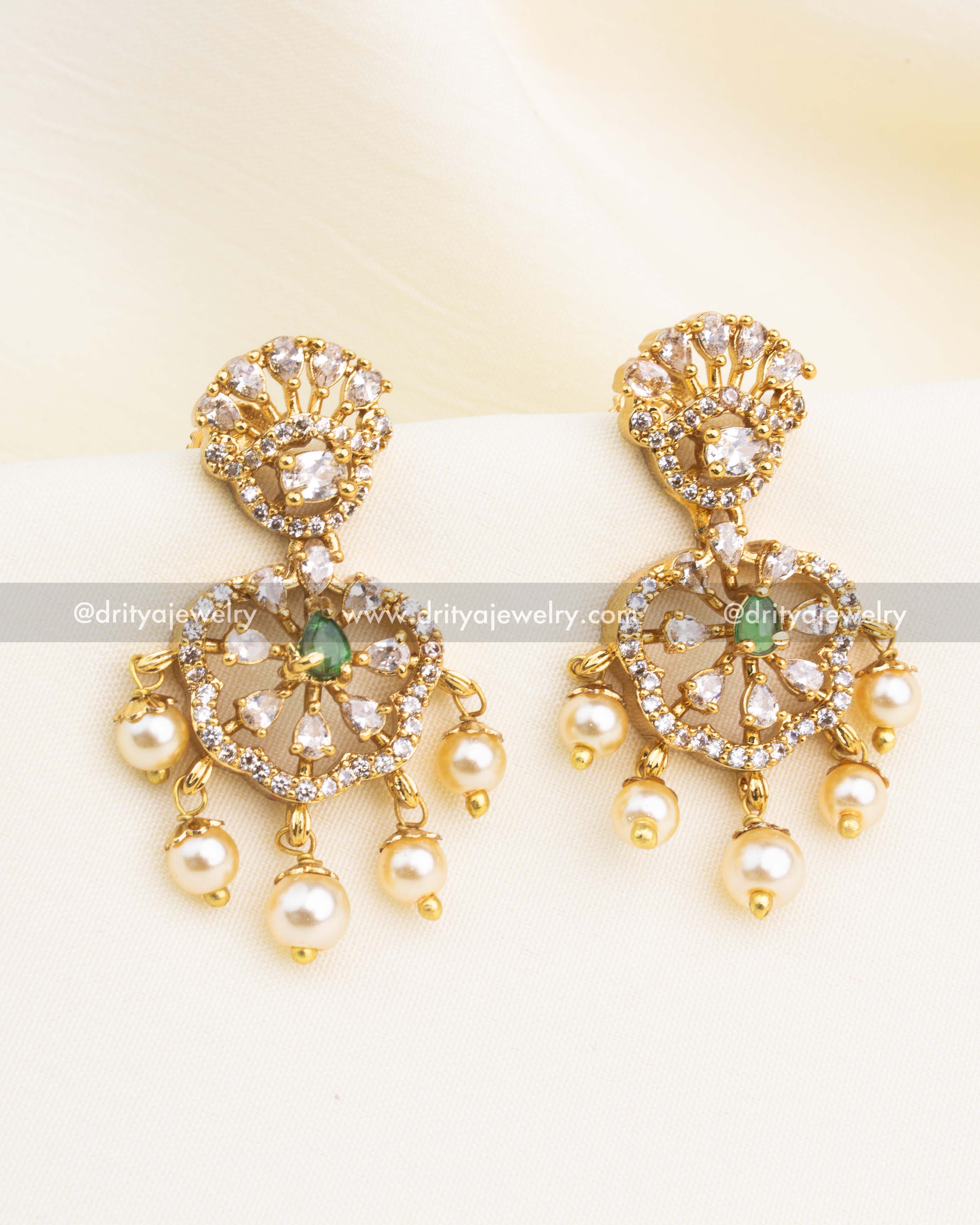 Gold finish dangler earrings with CZ medallion and pearl drops matching the Navaratnalu necklace.
