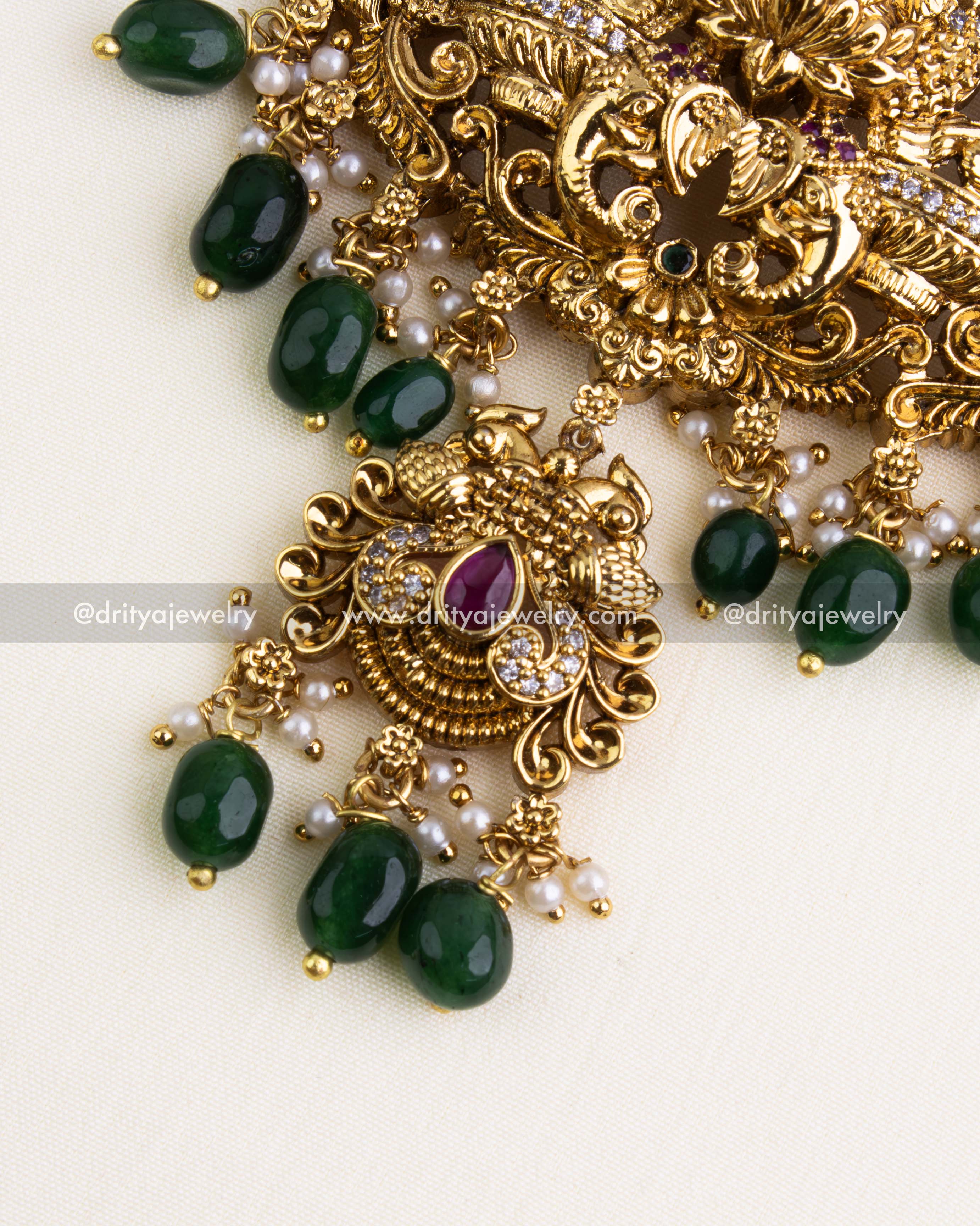 Emerald Green Drop Beads and Pendant Detailing with Ruby Centerstone and Pearl Accents