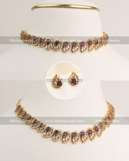 Purple CZ short necklace with gold polish and matching stud earrings.